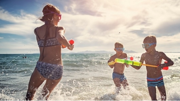 kids on vacation in San Felipe playing with Squirt Water Guns