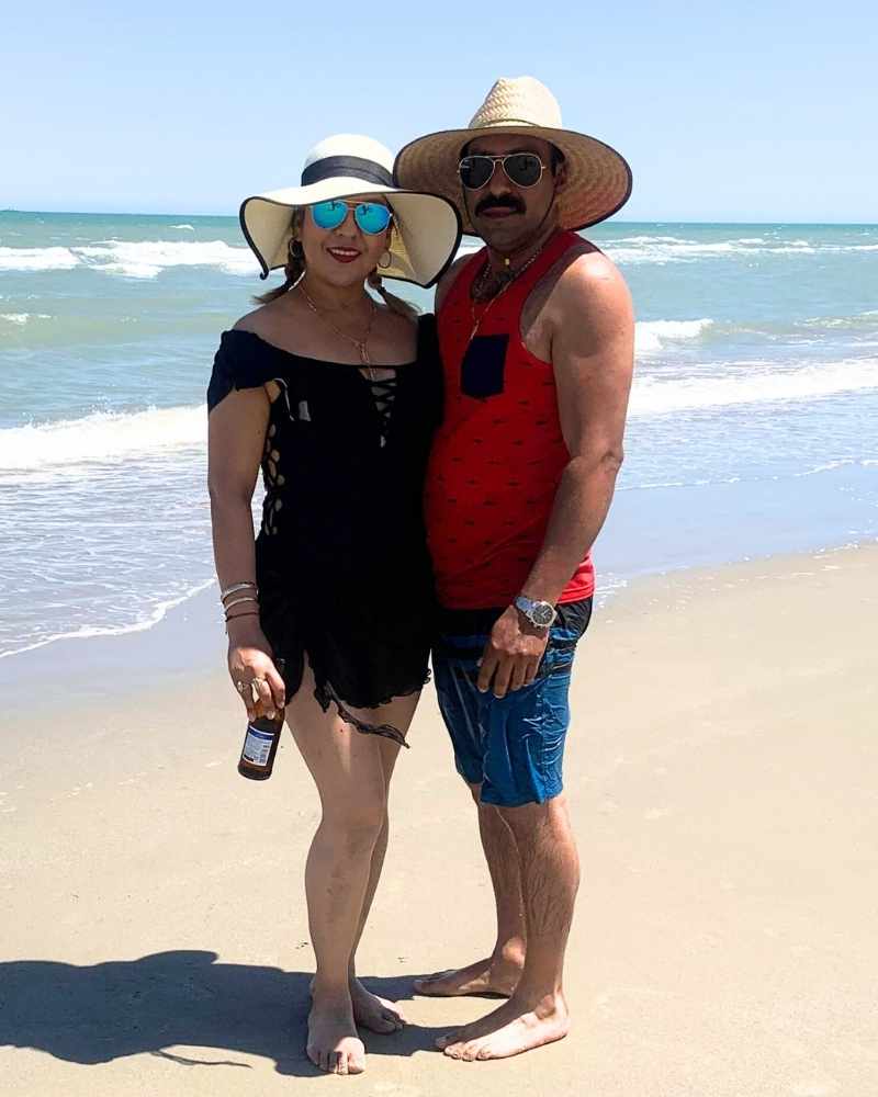 Couple smiling on the beach in San Felipe